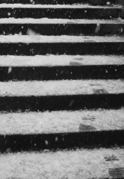 Footprints on snow-covered steps